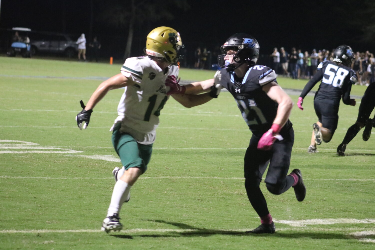 Maddox Spencer of Nease (No. 14) and Ponte Vedra’s Joe Mahoney (No. 21) presented a fun matchup to watch during the game.